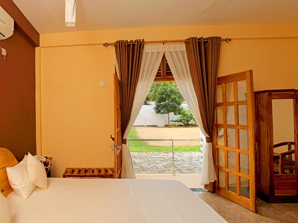 Bluewater Beach Resort Triquinimale Quarto foto